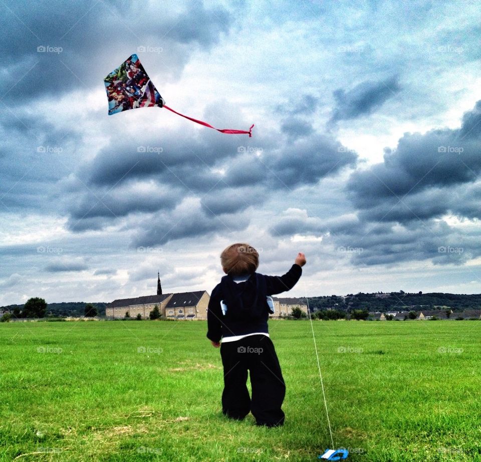 Boy flying a kite