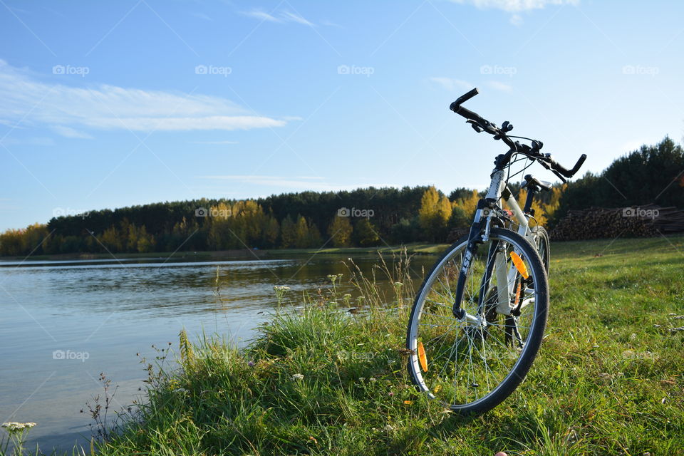 bike on a lake shore beautiful autumn landscape