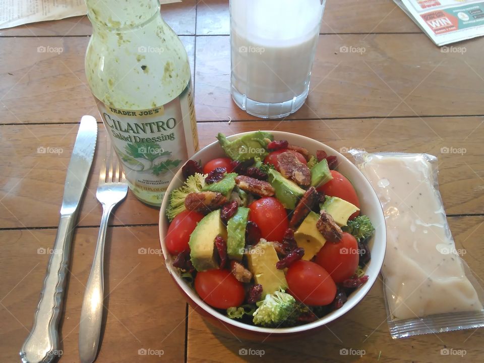 enjoying a healthy salad for lunch