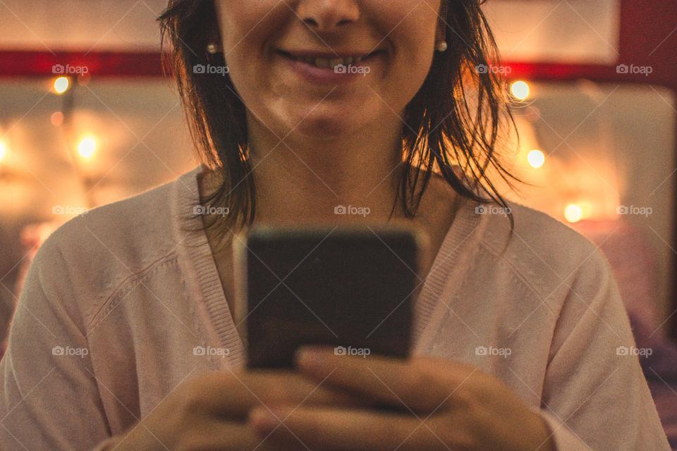 Young woman using smartphone