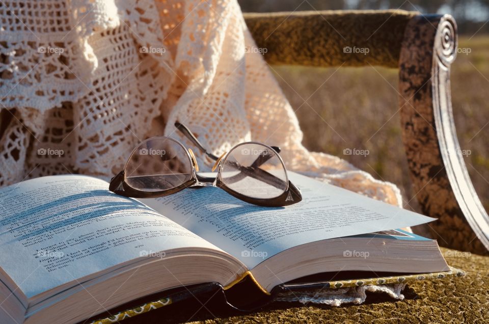 Antique Glasses On Antique Book In Field