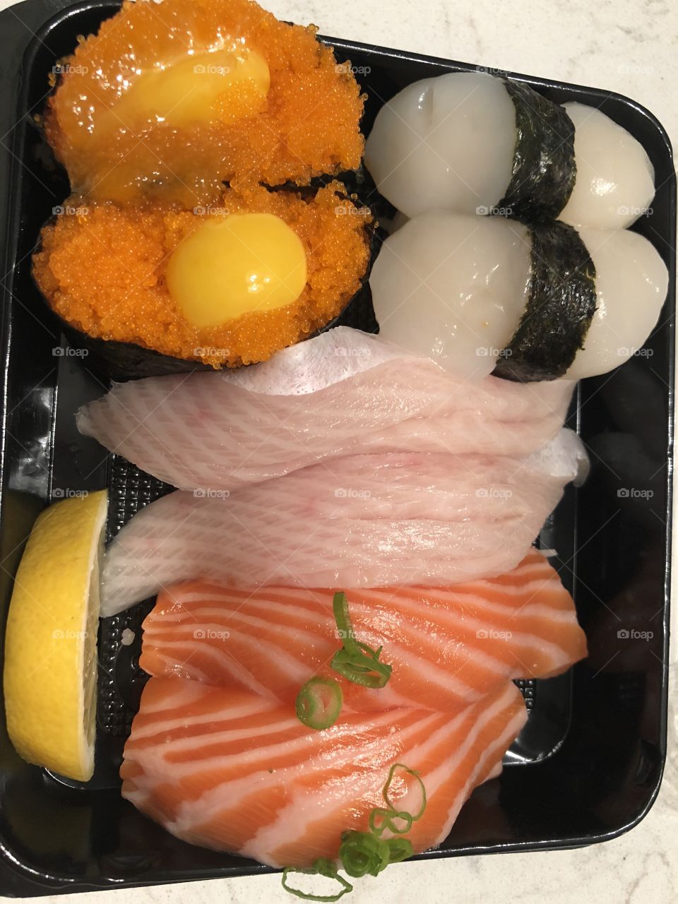 Sushi takeout fish raw egg tuna scallop