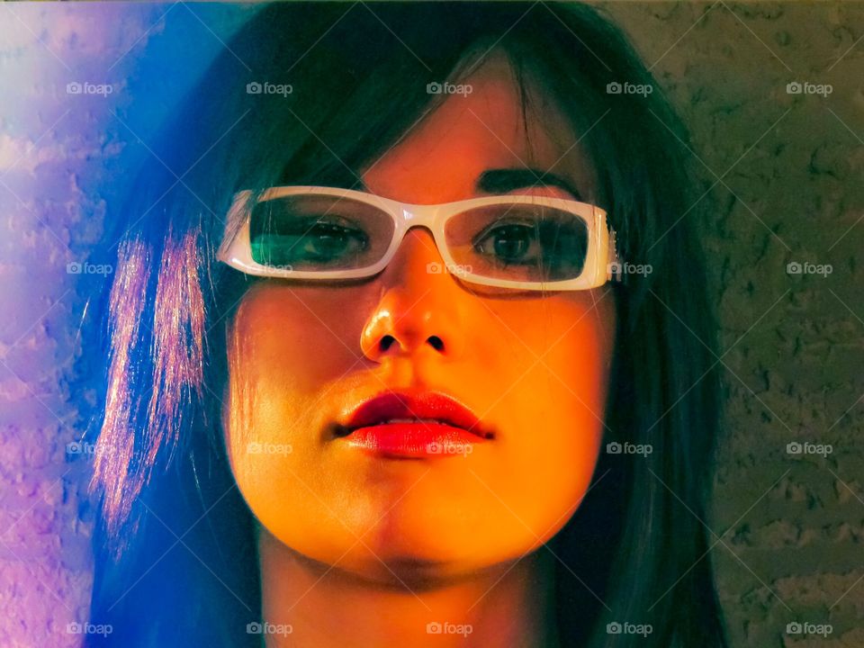 Retro beautiful woman in posing in glasses 