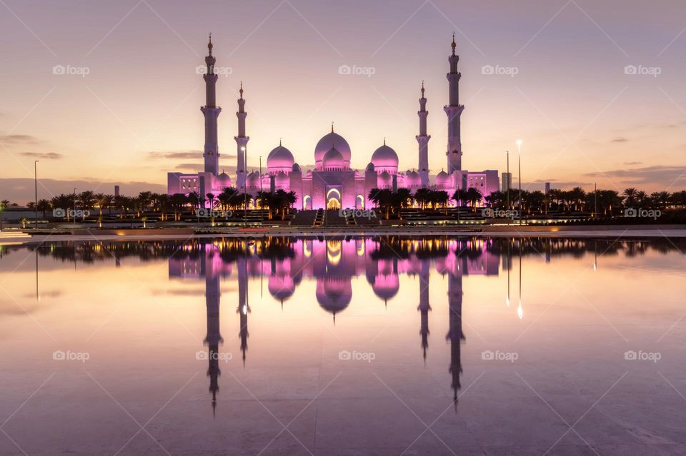 Sheikh Zayed Grand Mosque in Abu Dhabi with reflection in the lake