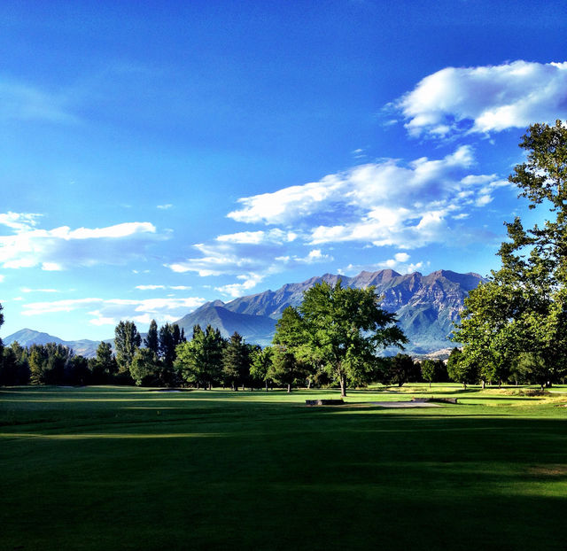 clouds trees mountains golf by dustinrogers
