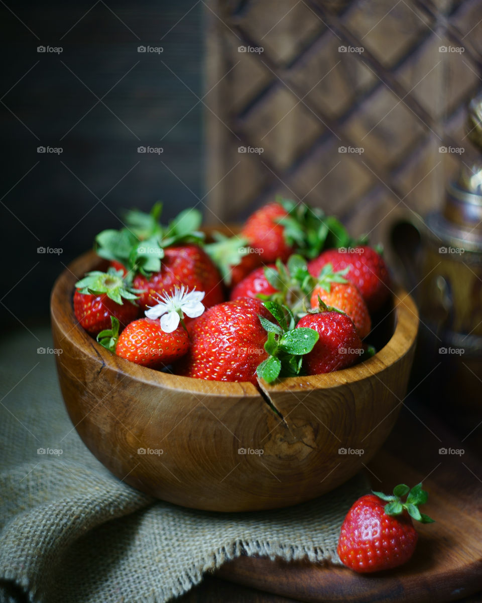 Strawberries in wooden bowl