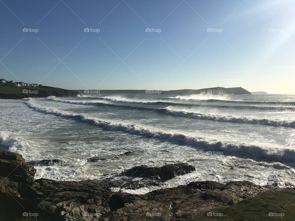 Huge crashing waves breaking down on the peaceful beaches of Cornwall 