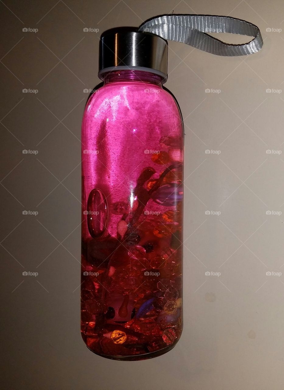Pink color story, floating pink bottle