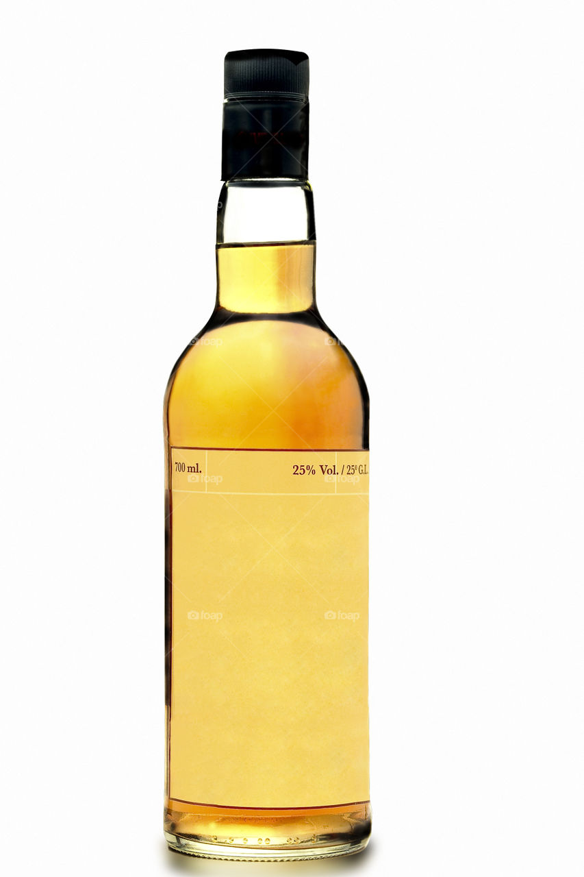 Whiskey bottle with blank label background