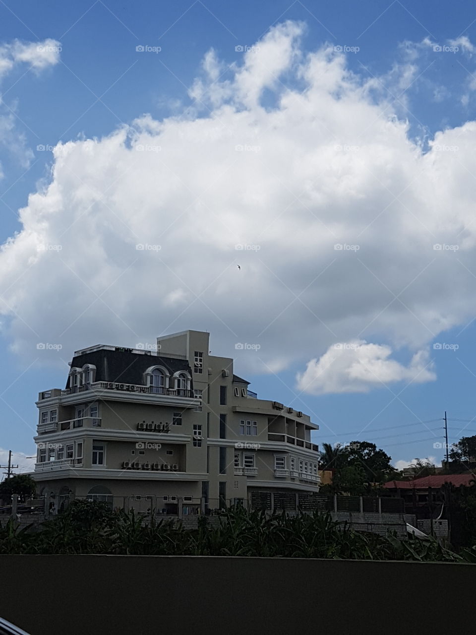 a castle beneath the big cumulus