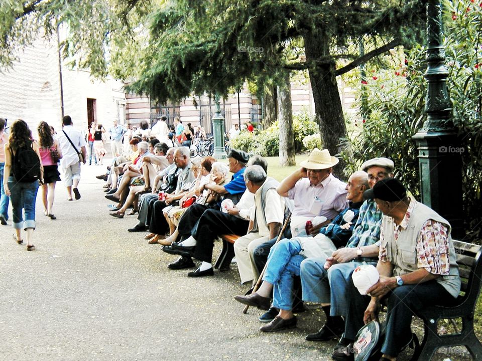 Passing the time of day. Gentlemen of Tolouse, France gather each day to socialize and pass the time of day