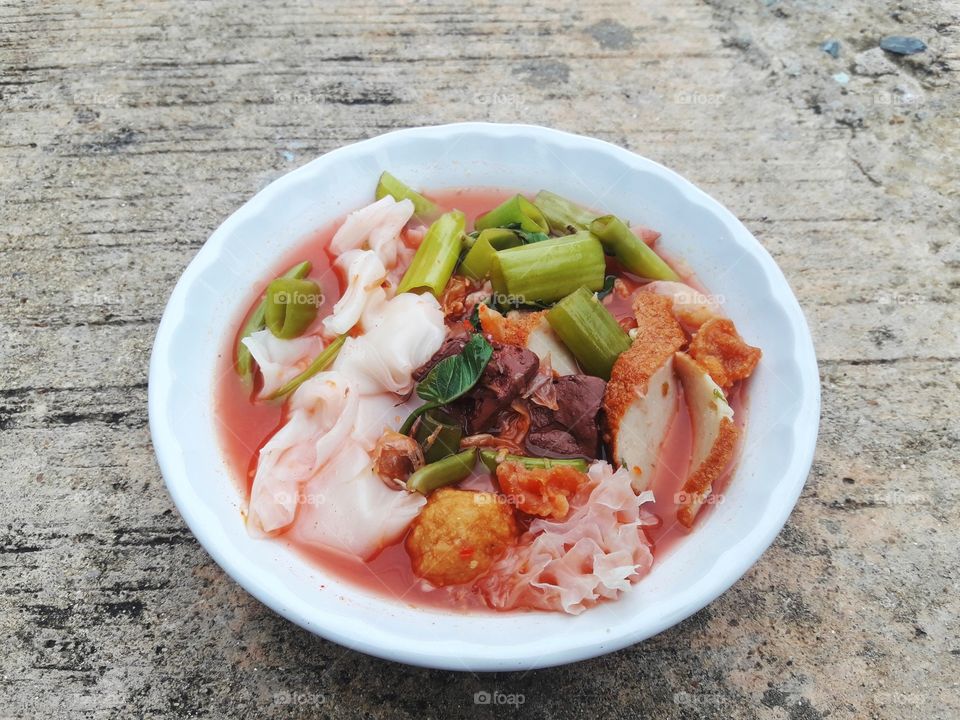 noodle on cement floor, lifestyle eating