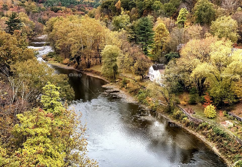 Picturesque small town America in autumn on a creek 