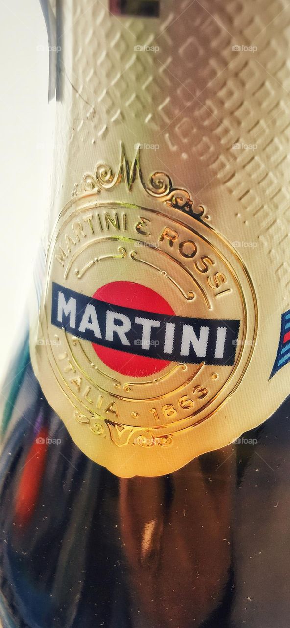 Your best macro shot view red form shape day part sun sunny home indoor gold golden sticker foil glass bottle drink champagne