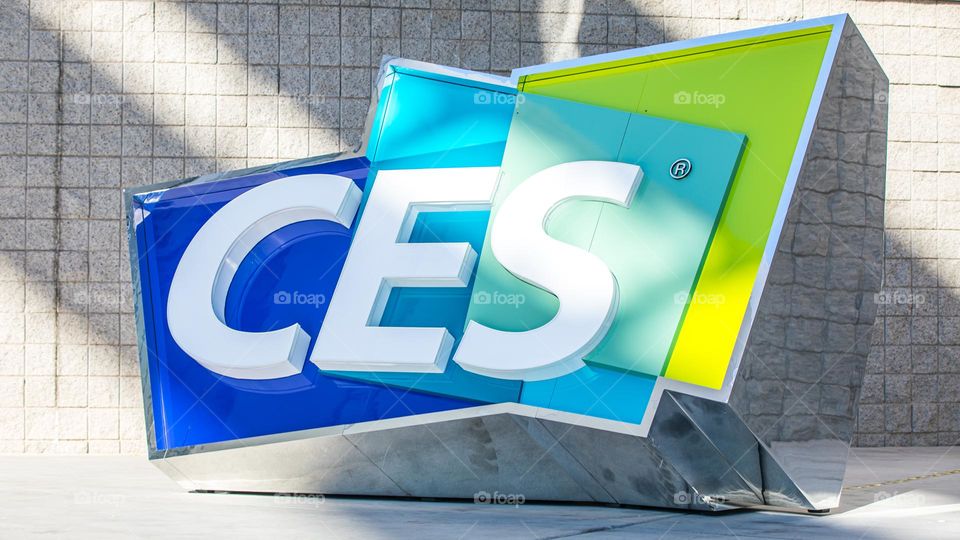 Las Vegas, NV 1-6-2023: Large logo of CES outside the entrance of LV Convention Center. Held annually, CES is the largest consumer electronics convention in the world. Vibrant cool colors on the sign.