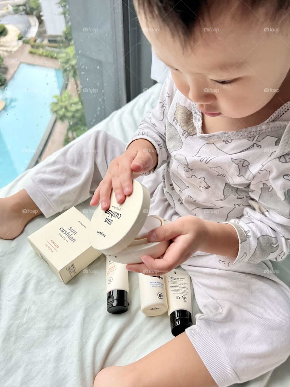 Asian toddler with Korean skincare brand for ezcema skin