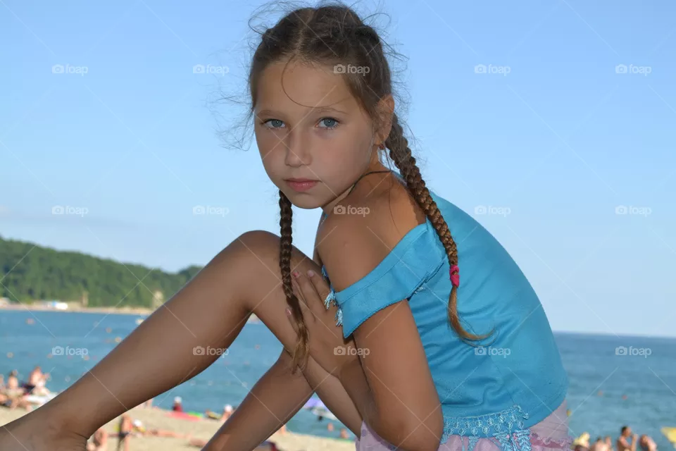 На море