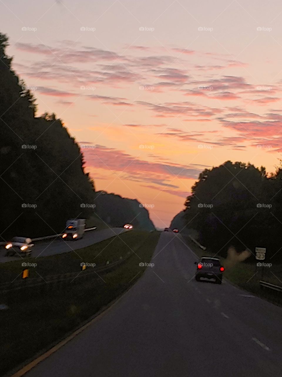 Commuting to work, sunrise over the highway