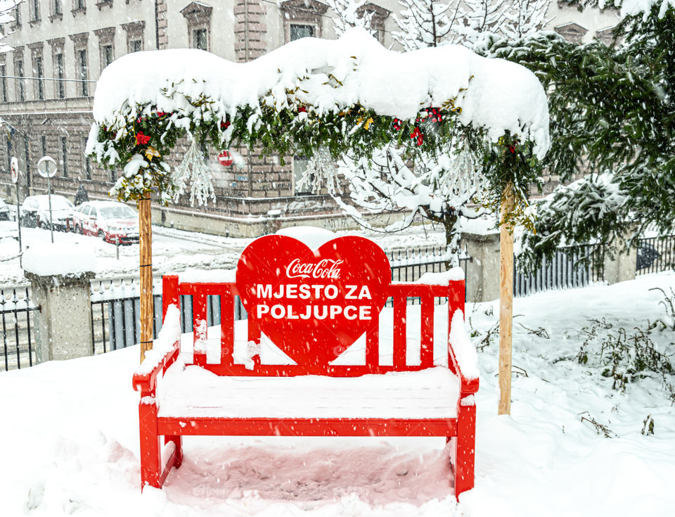 Coca-Cola place for kissing under the snow