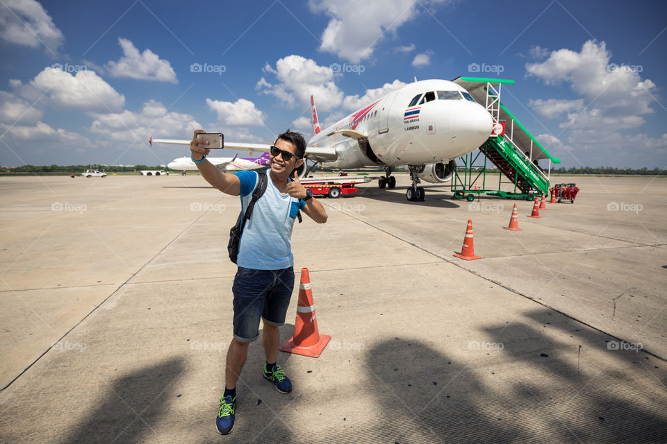 Man selfie with the plane 