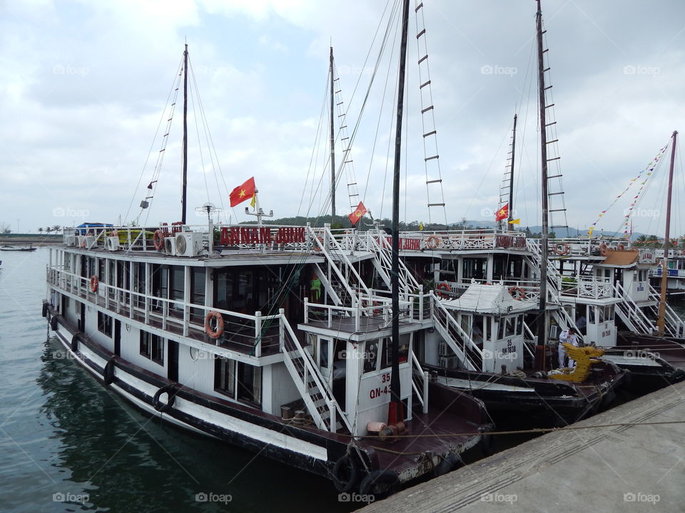 Boats docked in halong bay 