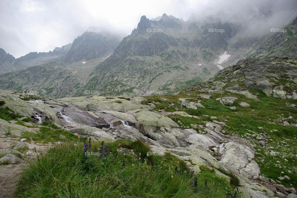 Scenic view of mountain at foggy weather