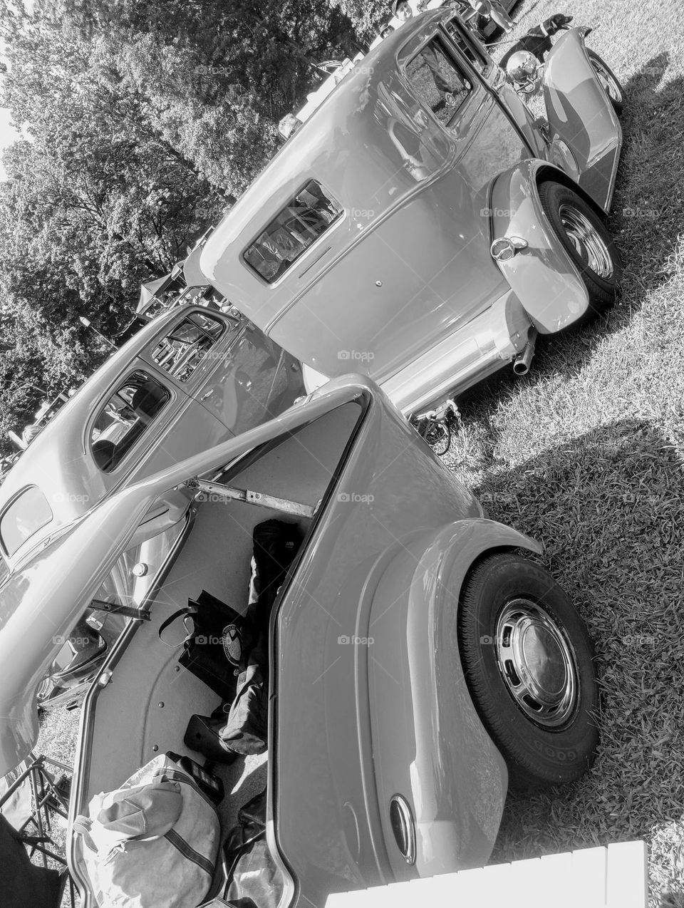 Black and White Vintage Car with a Trailer