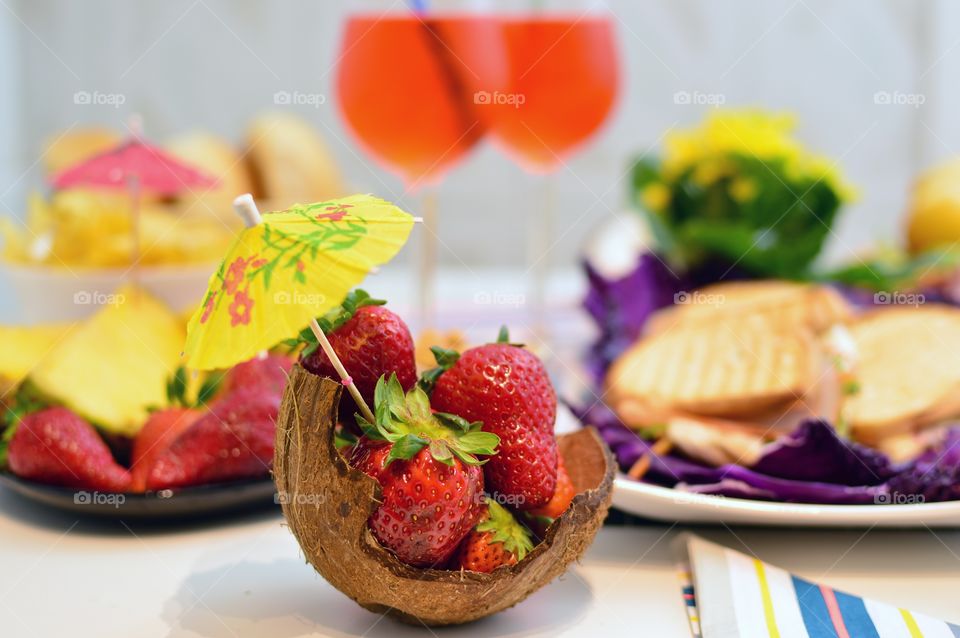 coconut basket with fresh strawberries