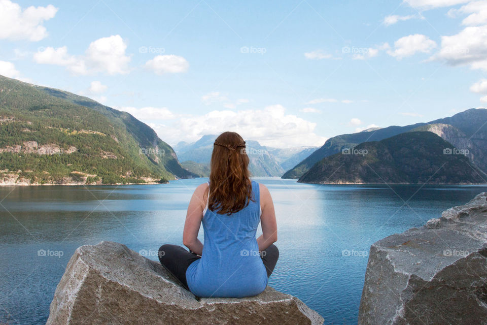 Meditating in Norway by the fjords 