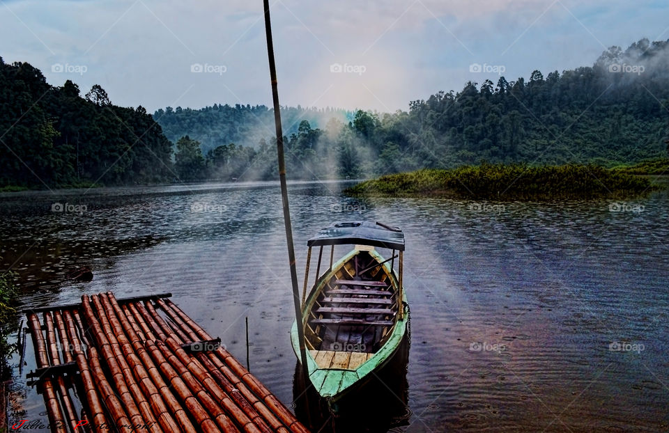 lake situ gunung indonesia. the beauty of the lake where the mountains and the light that illuminates the sky