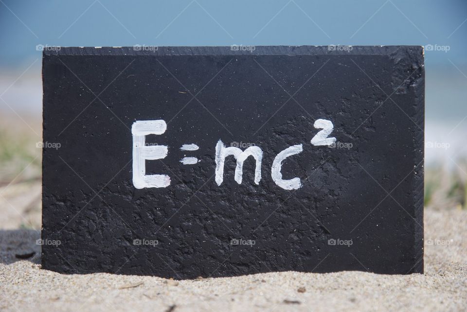 Mass energy equation painted on a stone