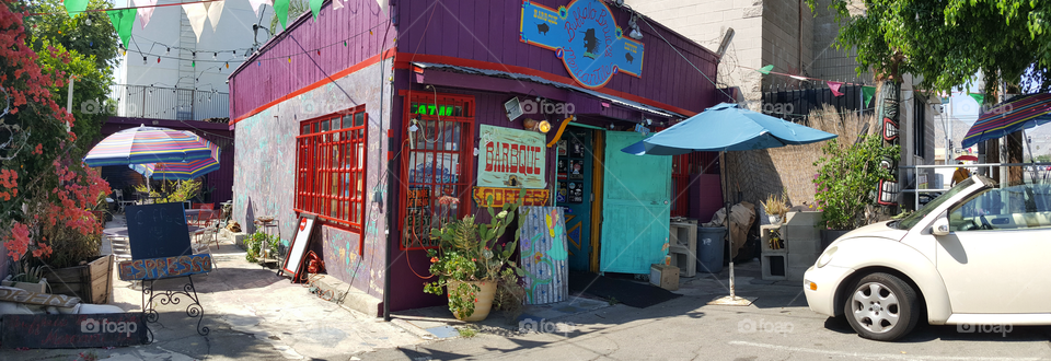 front of the colorful coffee shop near Pacoima California