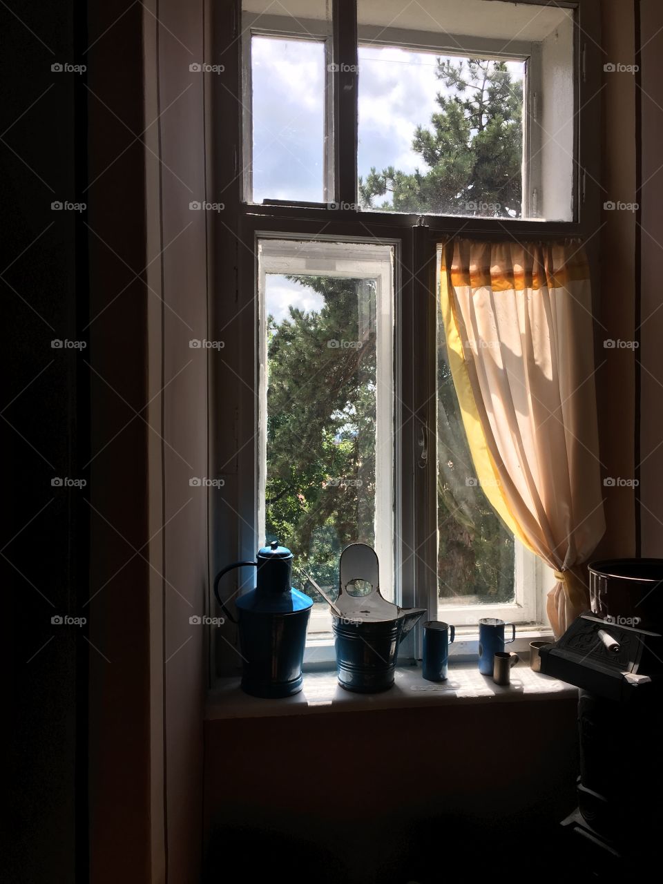 Cosy corner with window in old house 