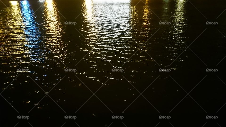 lights reflecting on water