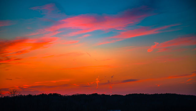 Cross, clouds, sunset