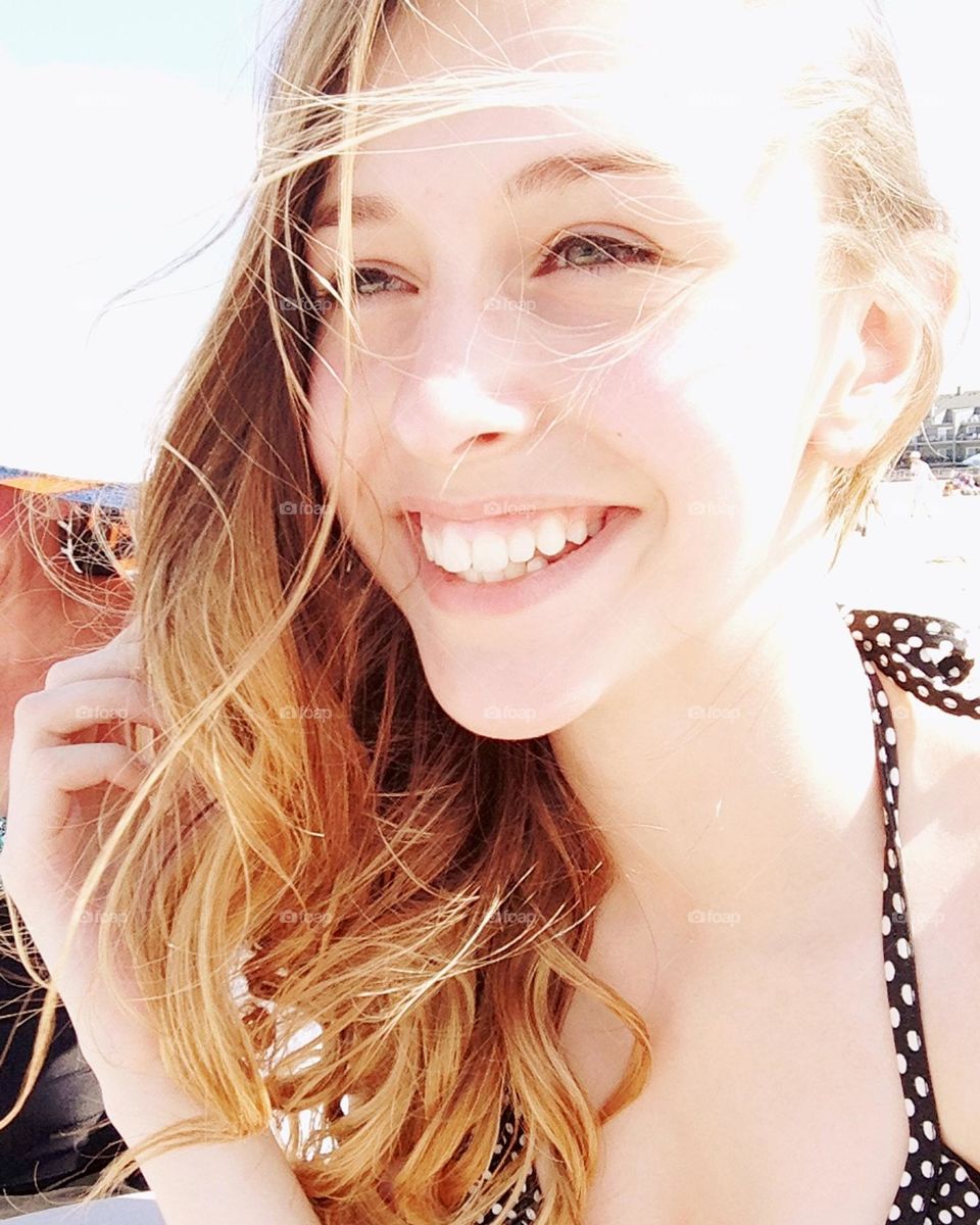 Expression of happiness, pretty young girls at the beach