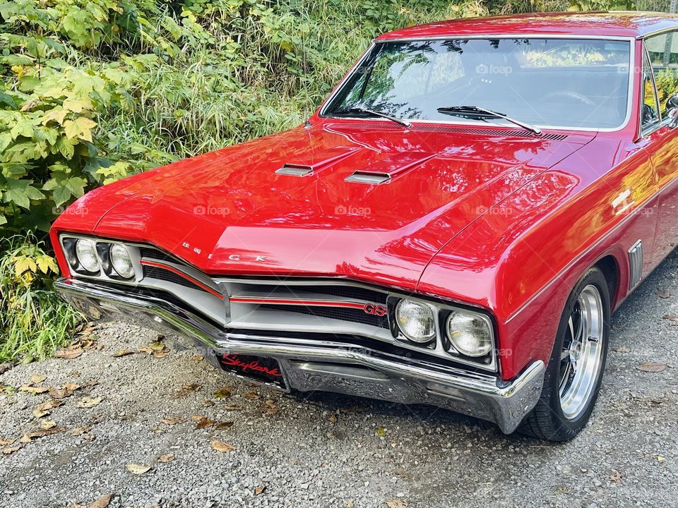 Red retro Buick outdoors 