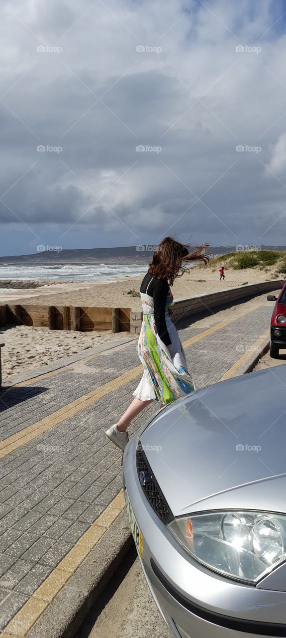 Returning to the car after a walk along side the beach.