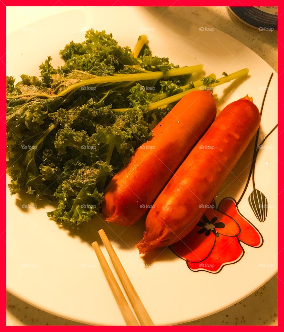 Sausages and kale for late night supper. It is simple yet good.