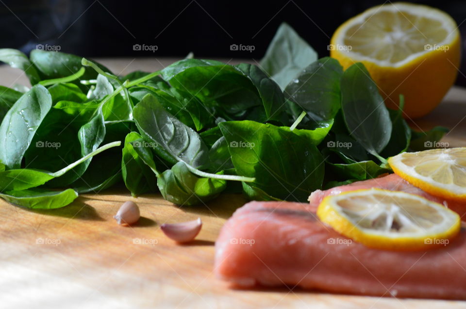 Ingredients for a delicious dinner of salmon and spinach