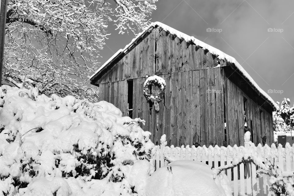 Old barn on snow