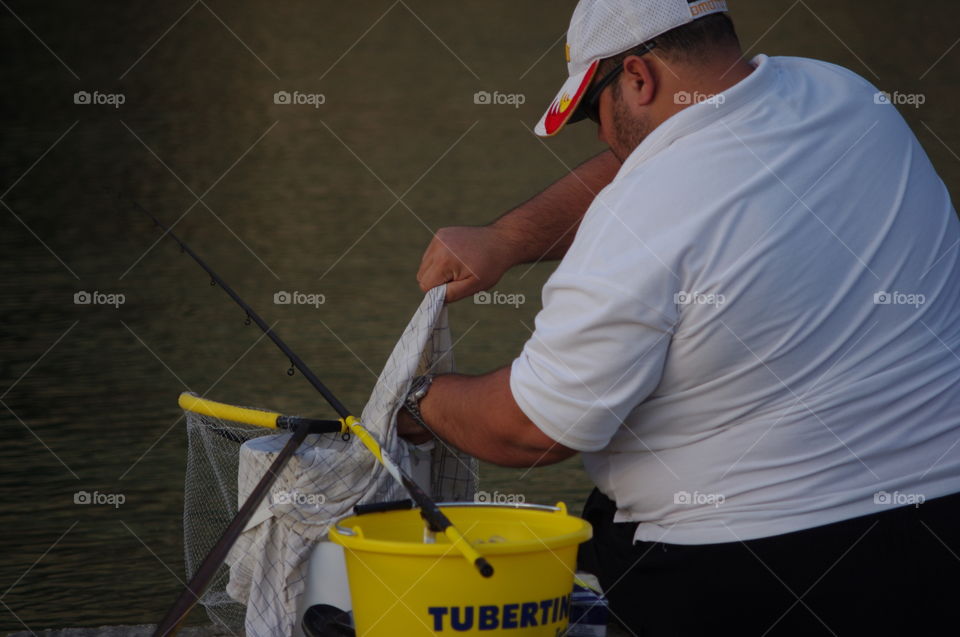 Man busy fishing