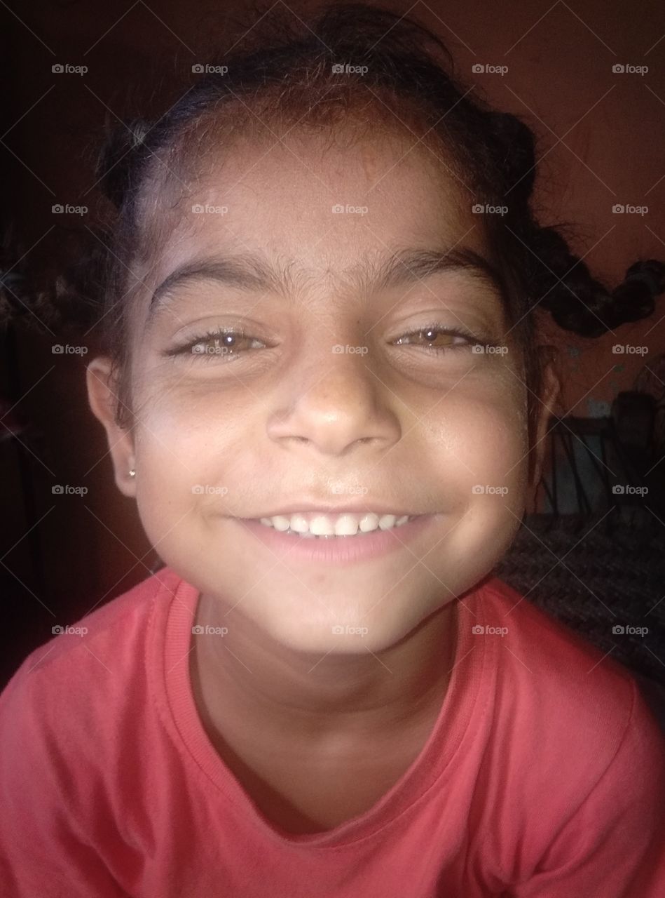 my cute uncle child so pretty eyes like green grass and looking in funny mood.  we are so impressed with her Lovely mood.  and are you enjoying with your children 😍