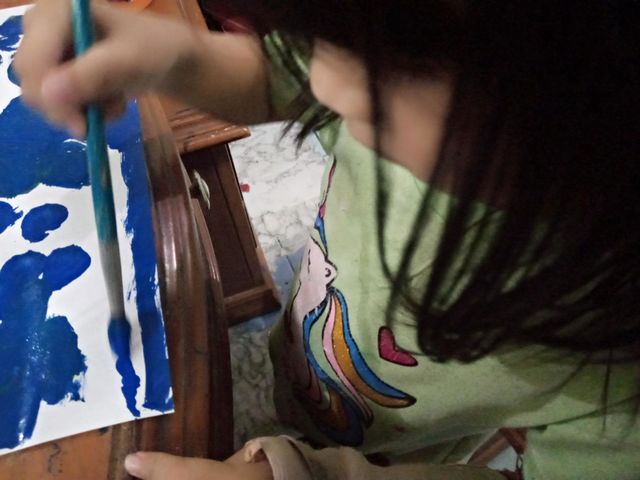 Little girl drawing
