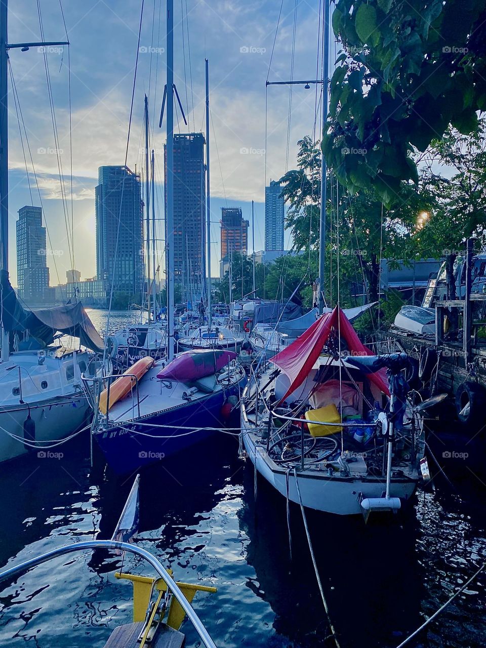 These are the boats that are tied to the shore at “Newtown Creek” by the “Pulaski Bridge” in LIC, Queens on a balmy Indian summer evening in 2023. Hypnotic Productions