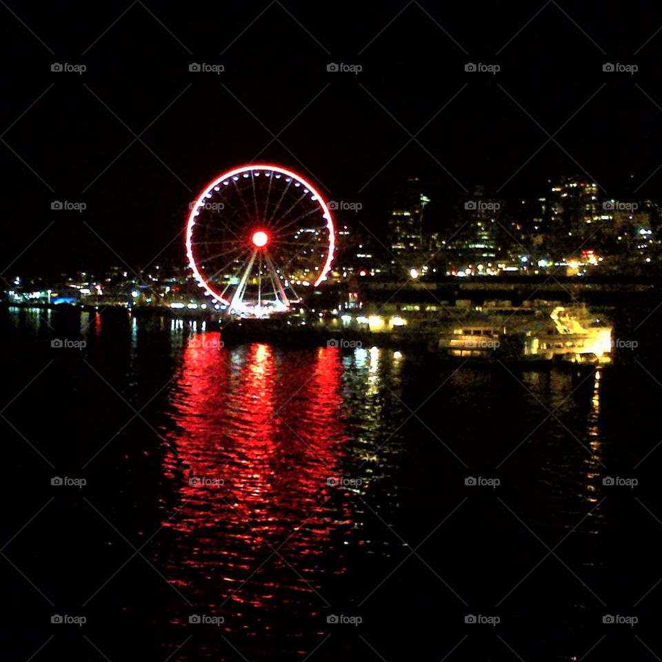 Seattle Great Wheel at Night with Red Lights Reflection 