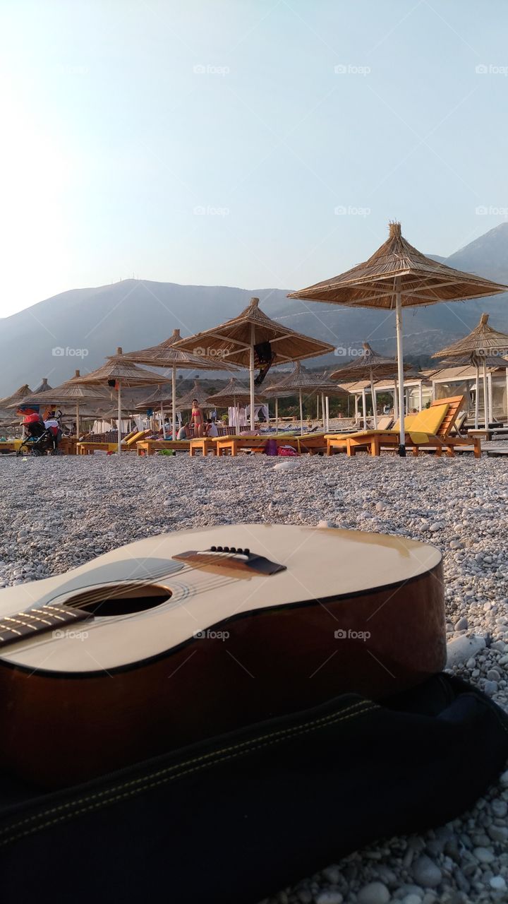 guitar and the beach