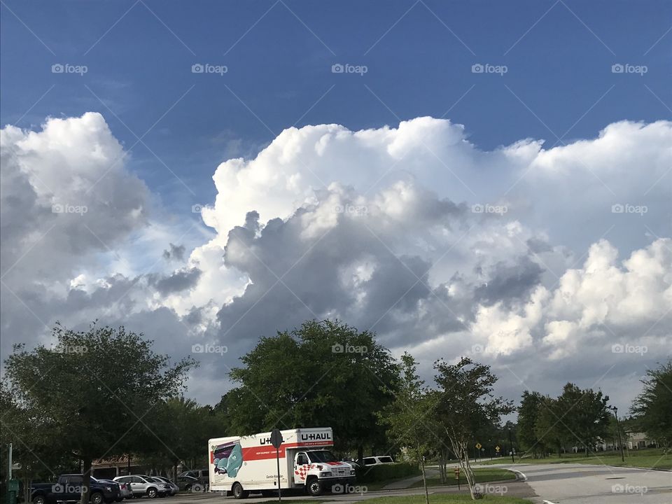 Truck under clouds 