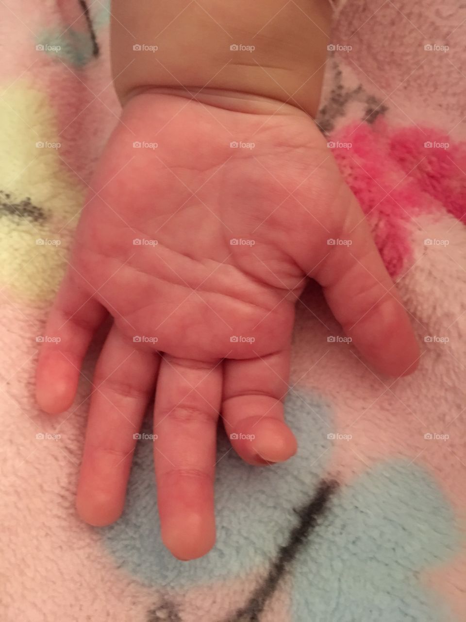 Tiny baby hand