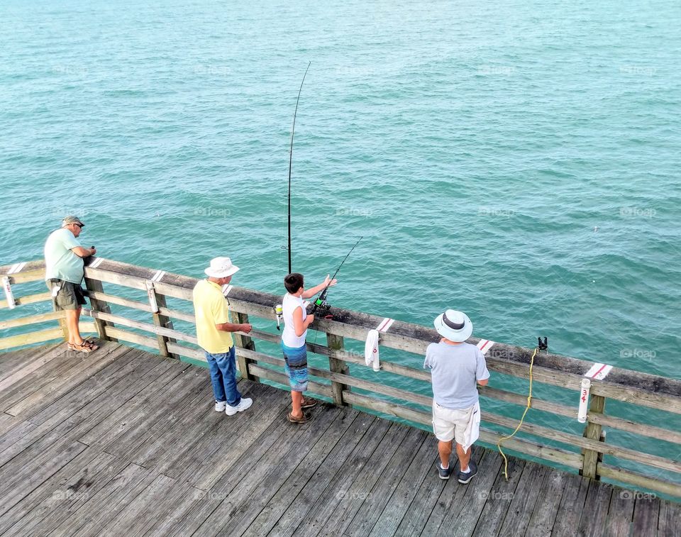 summer time fishing at the pier